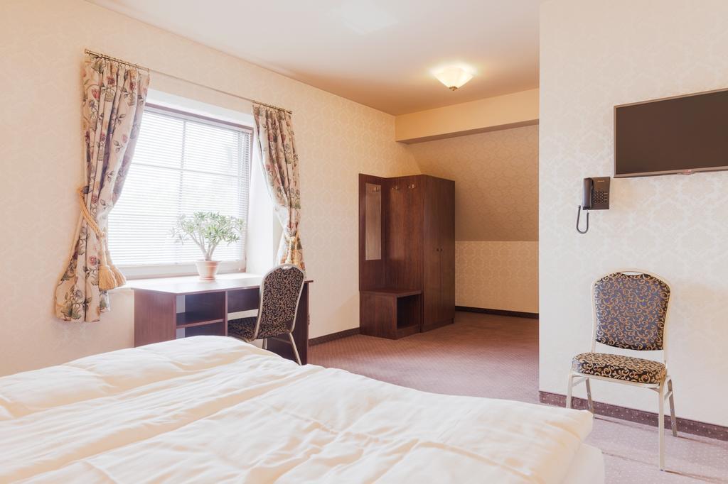 Hotel Folwark Zgierz Oda fotoğraf